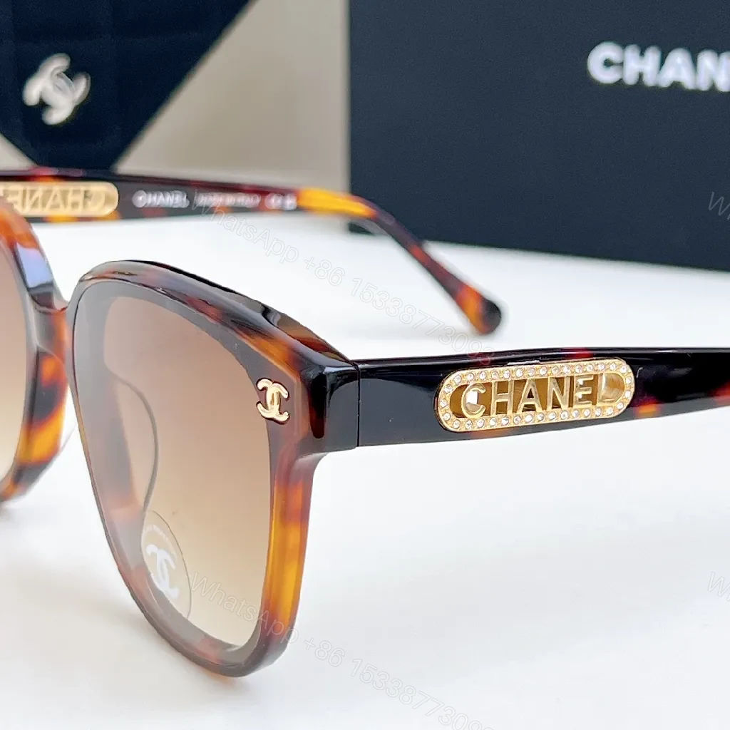 View 8 of Bold Black Sunglasses with Gold-Accent Luxury Detail (Sunglasses)