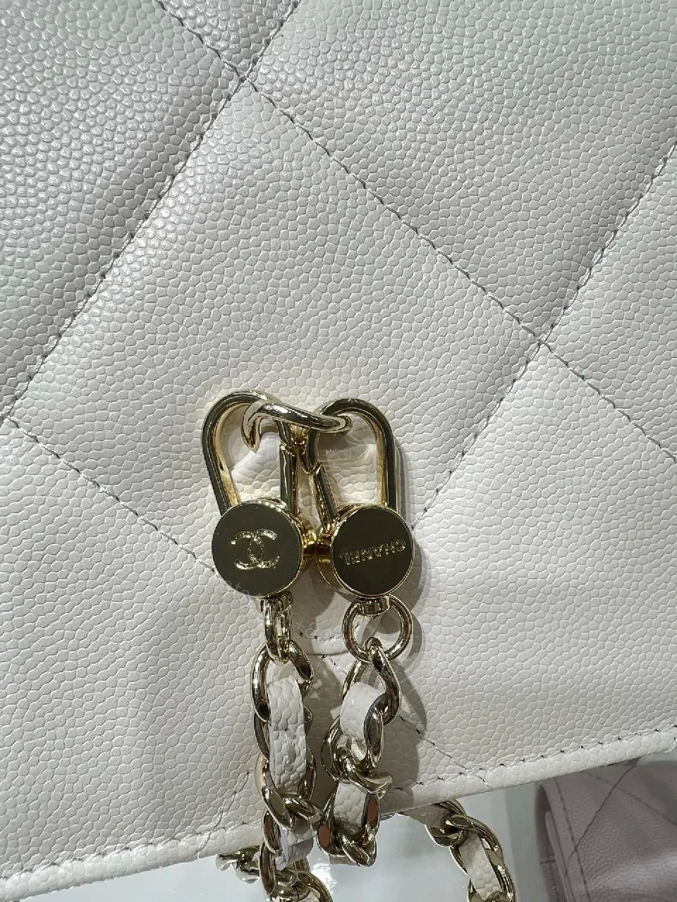 View 7 of White Quilted Mini Bag: Gold Logo, Structured Luxury, Compact