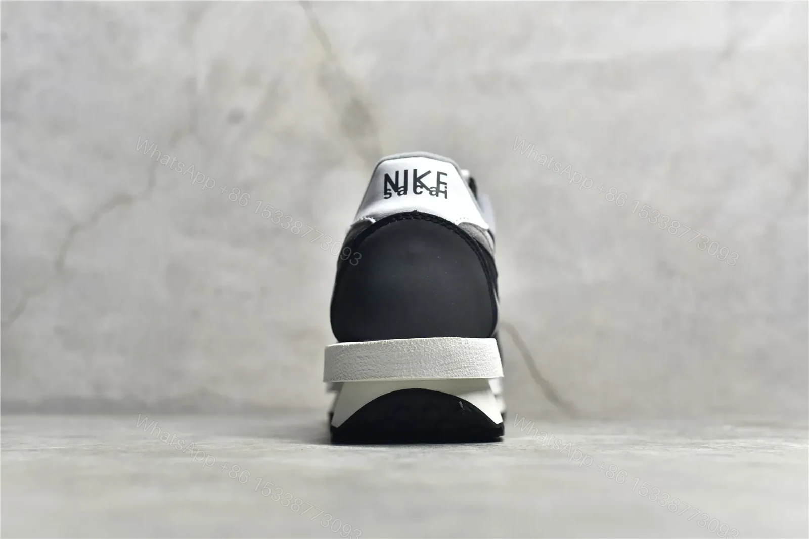 View 7 of Sacai × Nike Waffle Black and White Reps
