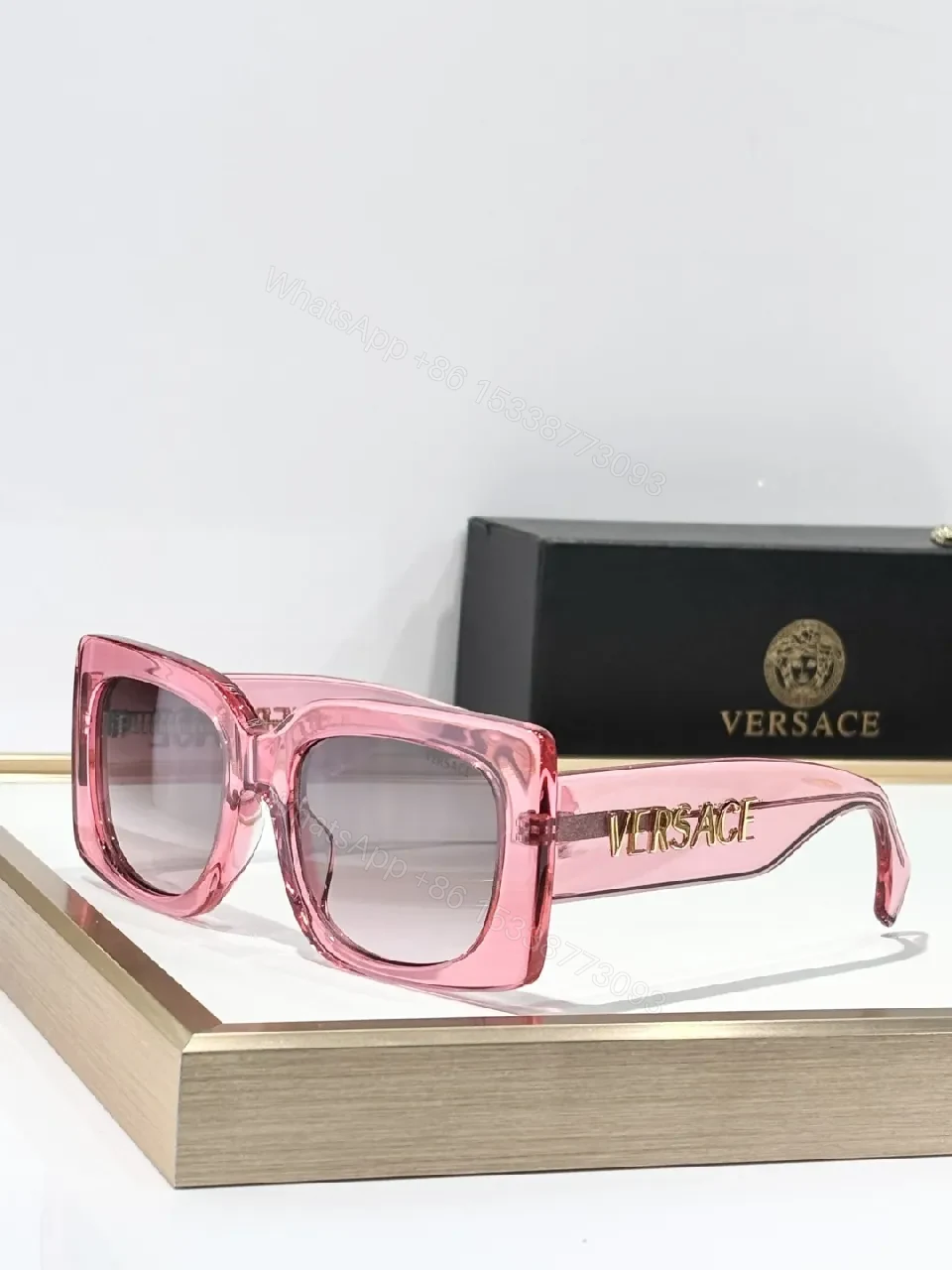 View 9 of Bold Black Statement Sunglasses with Logo-Injected Glamour