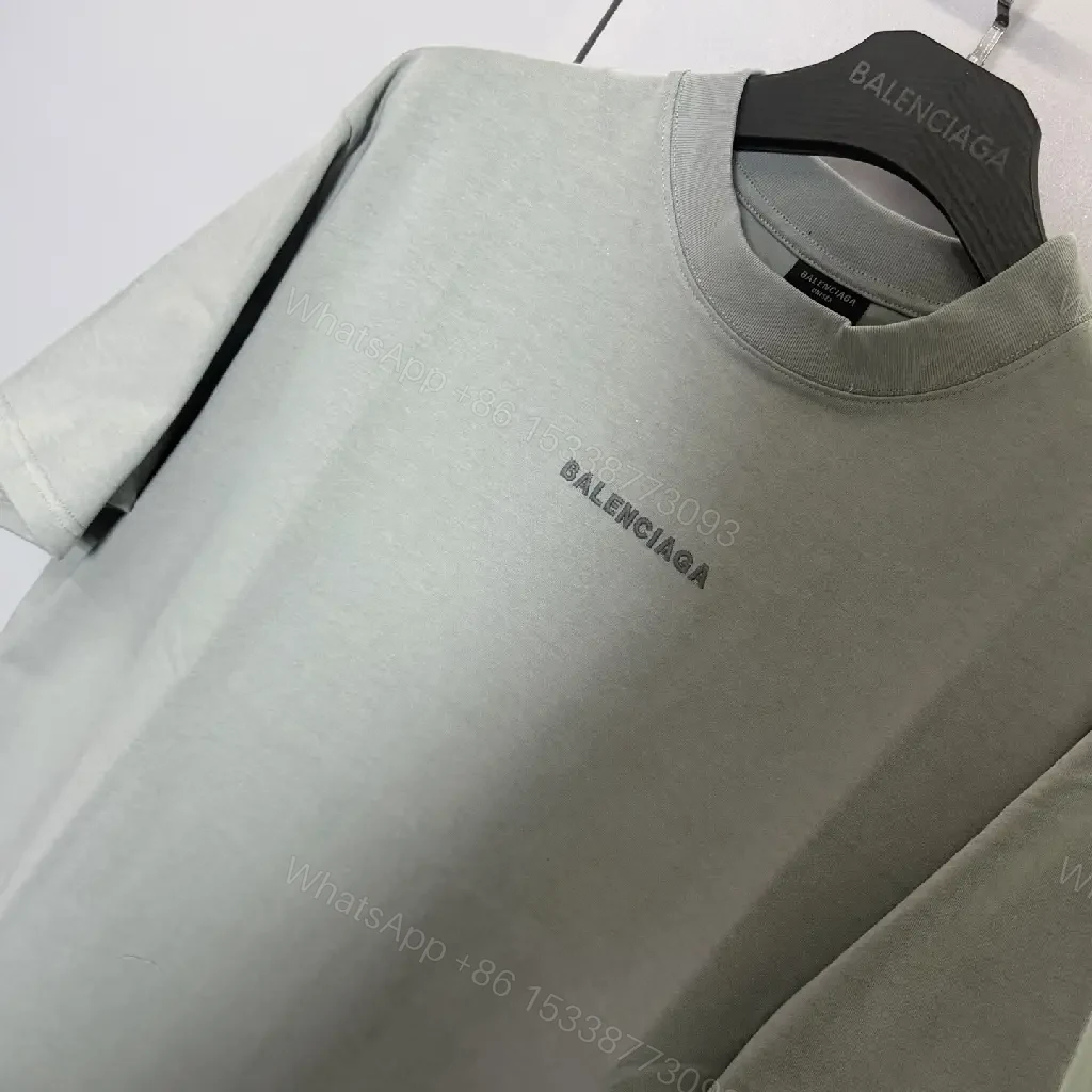 View 4 of Mint Green Minimalist Tee: Soft-Cotton, Refined Logo, Everyday Luxury