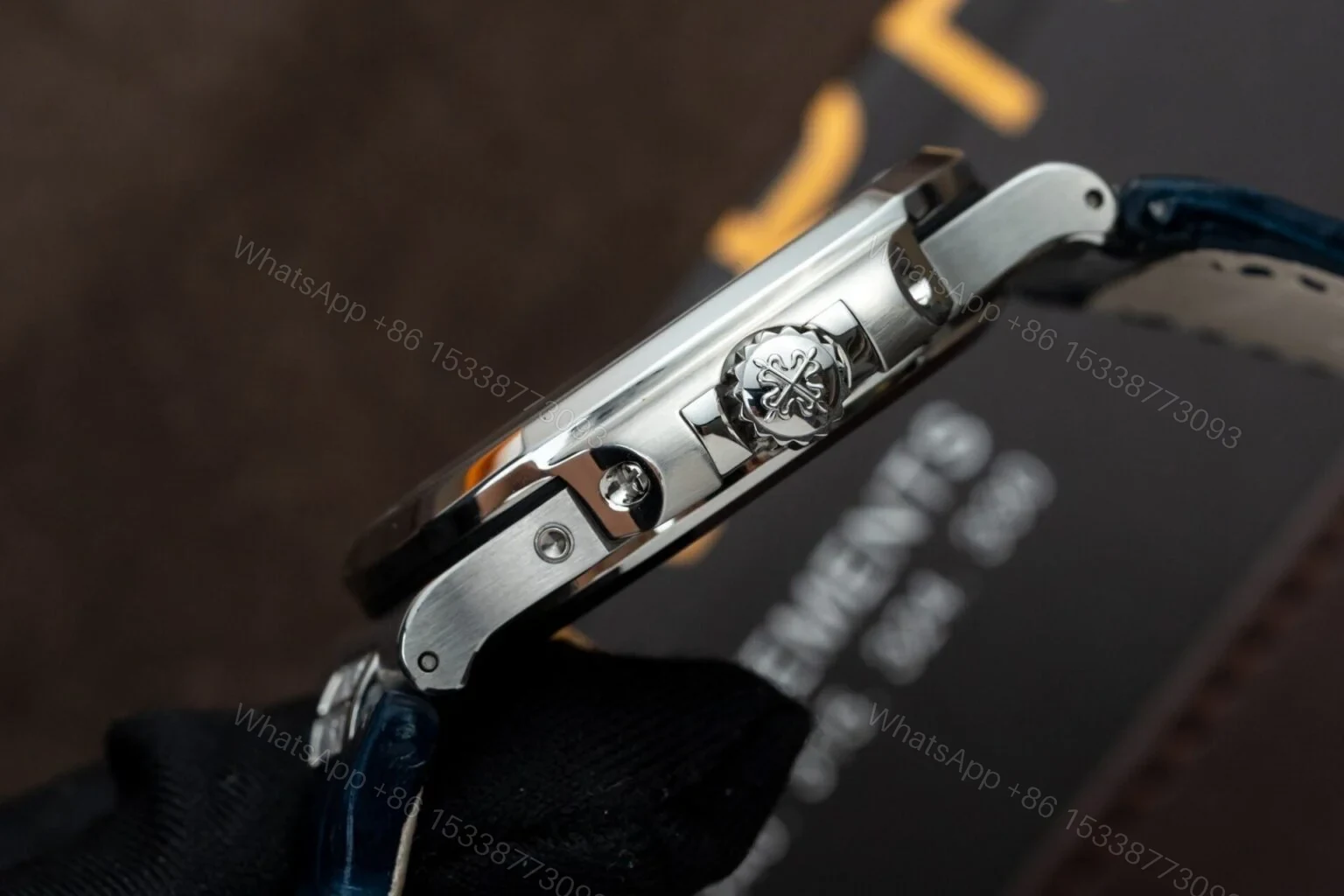 View 4 of Replica Patek Philippe Nautilus White Gold Blue Dial 40mm
