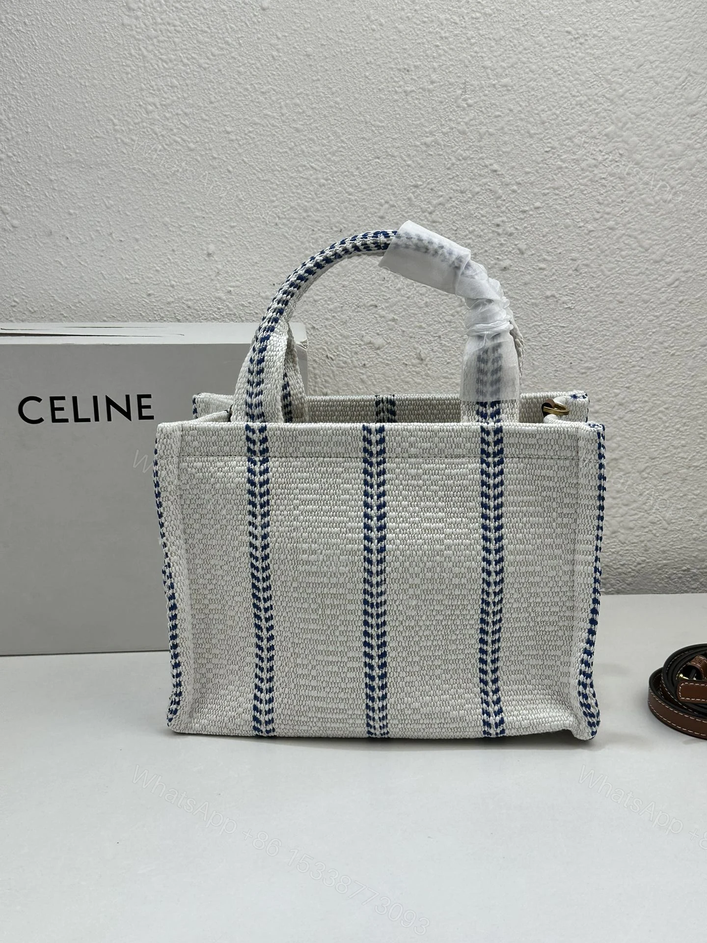 View 5 of CELINE SMALL CABAS THAIS IN STRIPED TEXTILE AND CALFSKIN XHITE/BLUE 25CM 199162EYI01BB