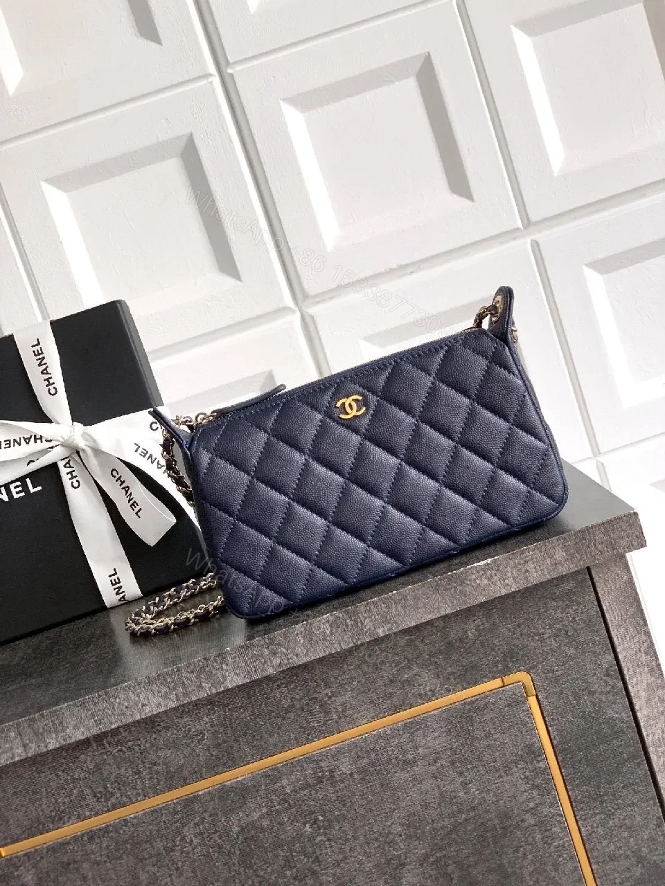 Navy Quilted Crossbody: Gold-Emblem, Compact Luxury Bag — view 1