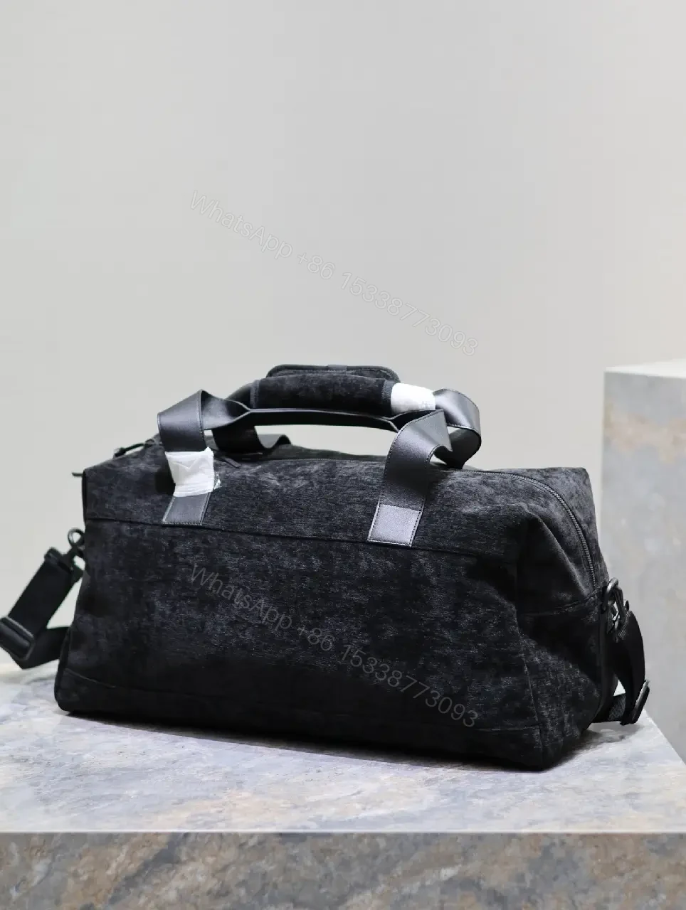 View 9 of Compact Luxe Duffel: Premium Textured Carryall with Subtle Detail