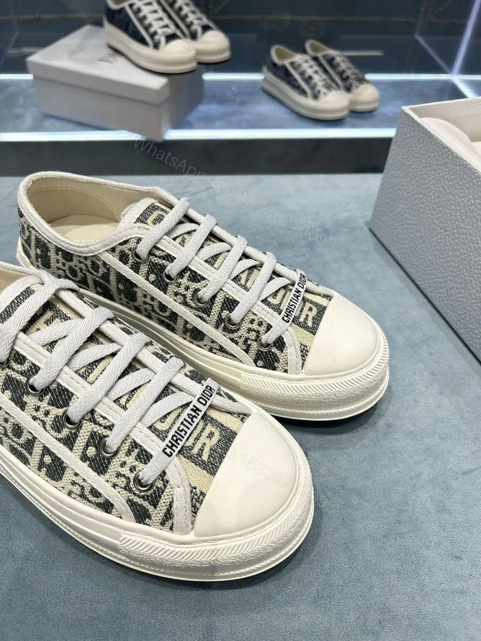View 7 of Monochrome Textured Low-Top Sneakers with Luxe Monogram Texture