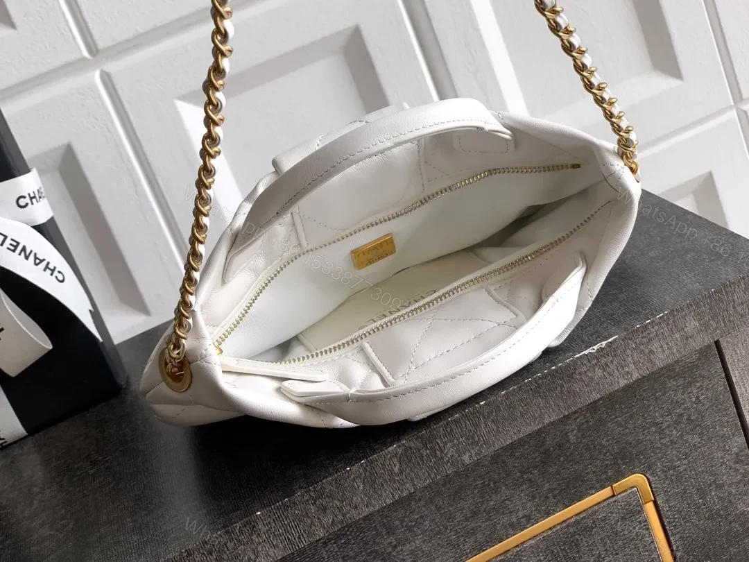View 2 of Pearl White Quilted Satin Mini Bag with Bow Detail and Gold Logo