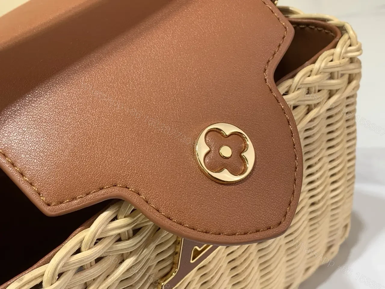 View 9 of Light Beige Straw Tote Bag with Leather Handles & Gold LV Charm