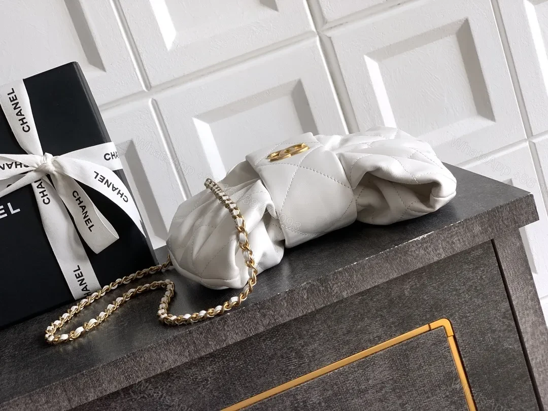 View 6 of Pearl White Quilted Satin Mini Bag with Bow Detail and Gold Logo