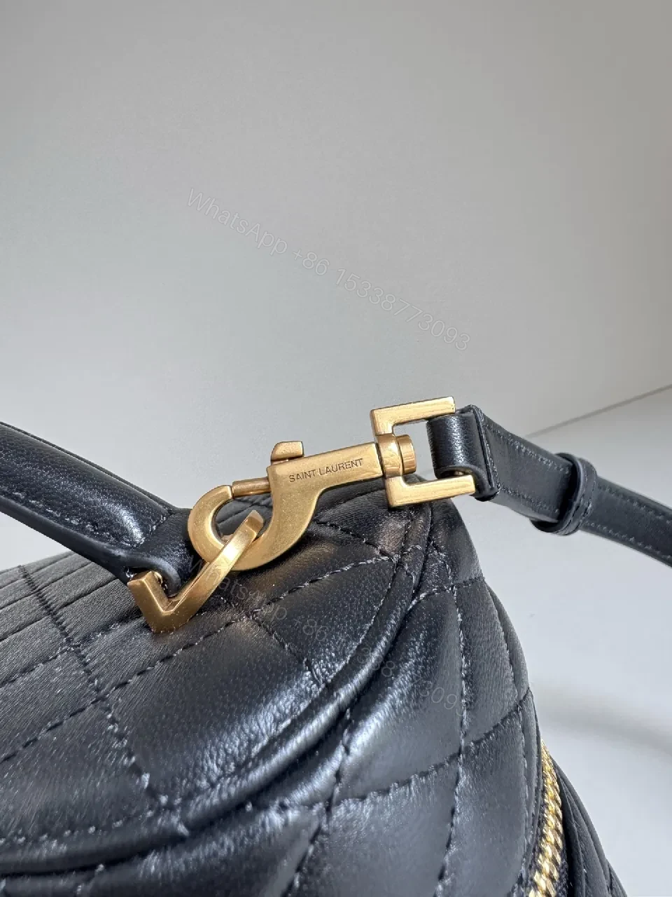 View 5 of Quilted Crossbody Bag: Black Leather, Gold-Detail, Compact Luxe