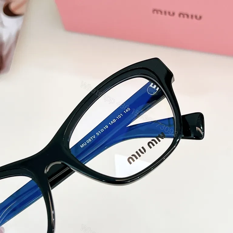 View 9 of Black Acetate Cat-Eye Eyewear â€“ Miu Miu Signature Detail