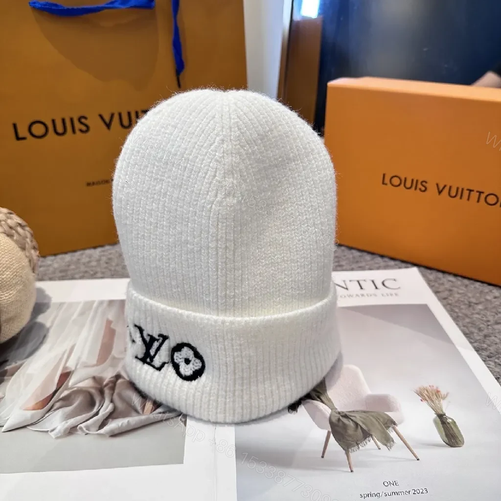 View 6 of White Knit Beanie – Luxe Logo Detail, All-Season Comfort