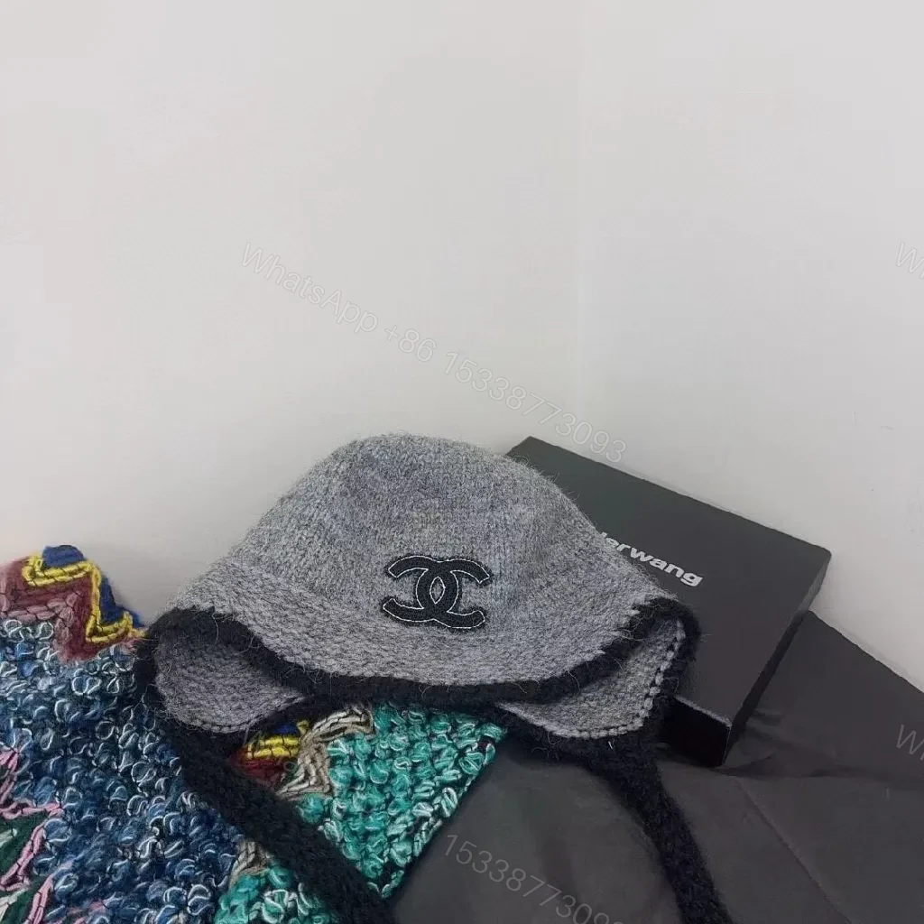 View 4 of Chic Knit Beanie with Logo Detail: Cozy Luxury Everyday