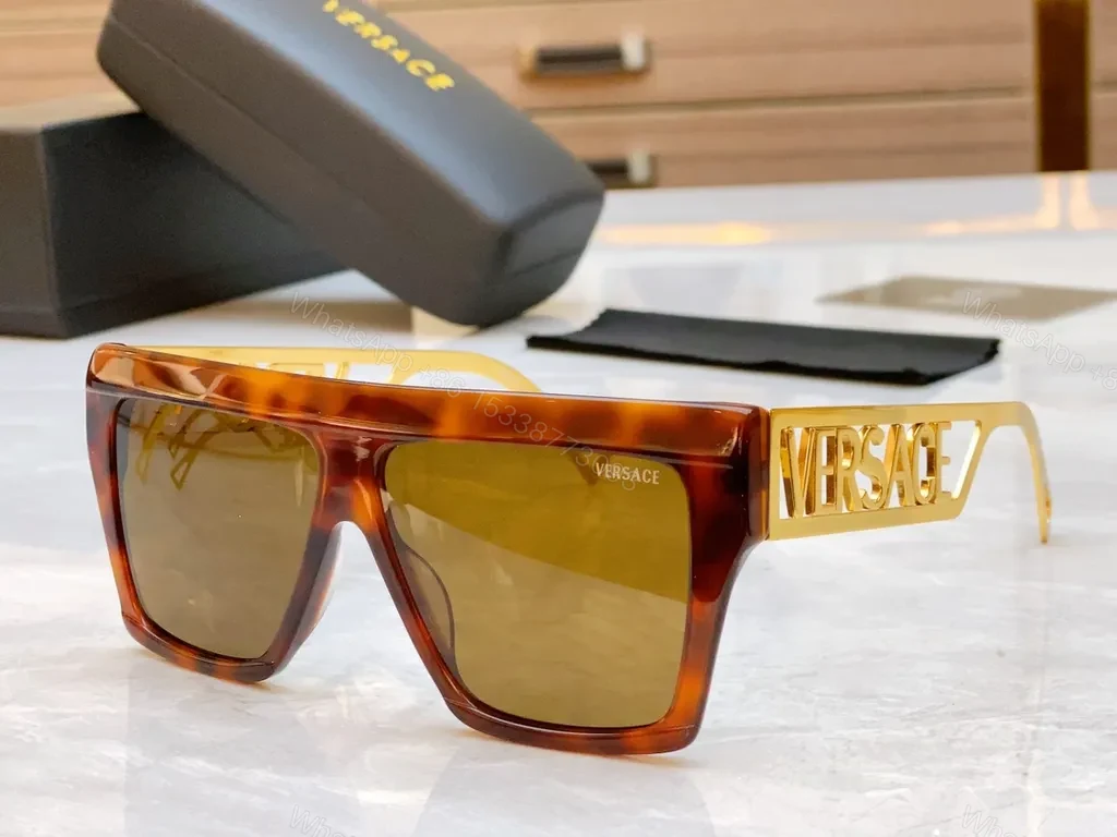 View 4 of Bold Black & Gold Luxe Sunglasses - Statement Frame, All-Day Comfort