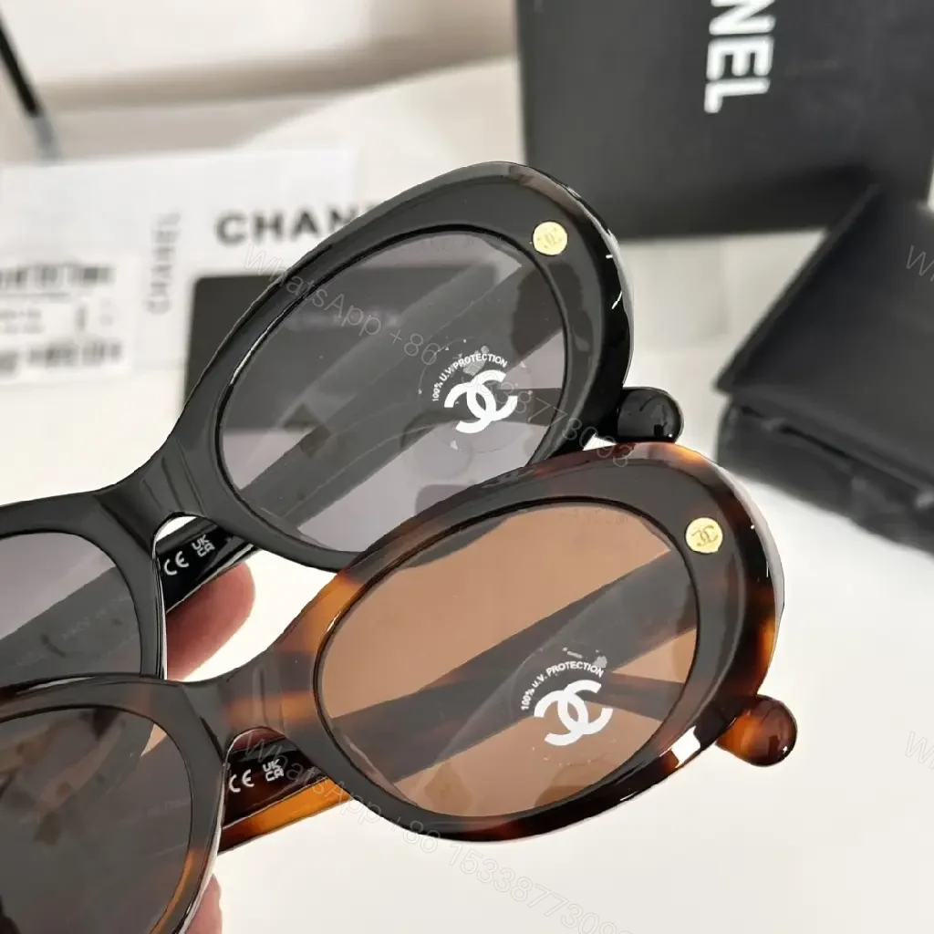 View 5 of Lux Black Round Sunglasses with Gold Hardware, Oversized UV Protection