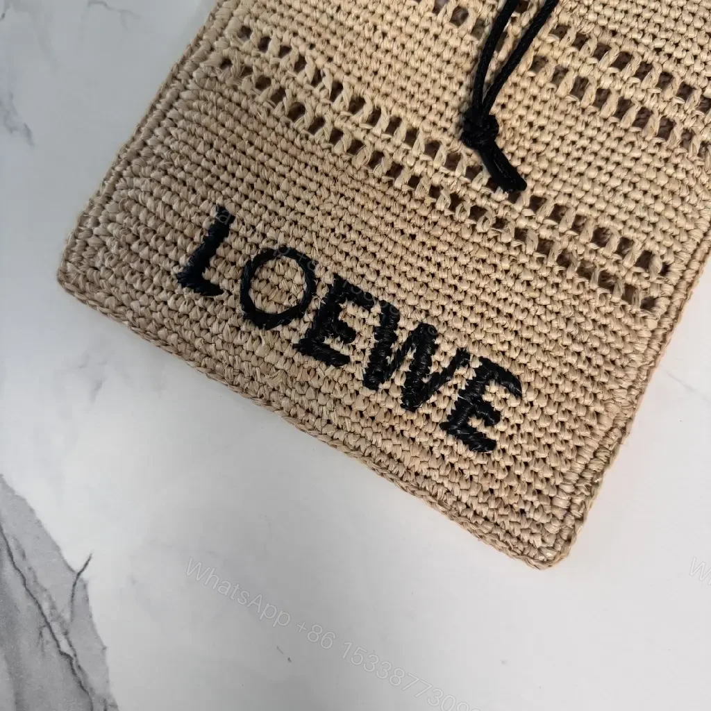 View 4 of Beige Straw Crochet Bag with LOEWE Logo Drawstring Tote