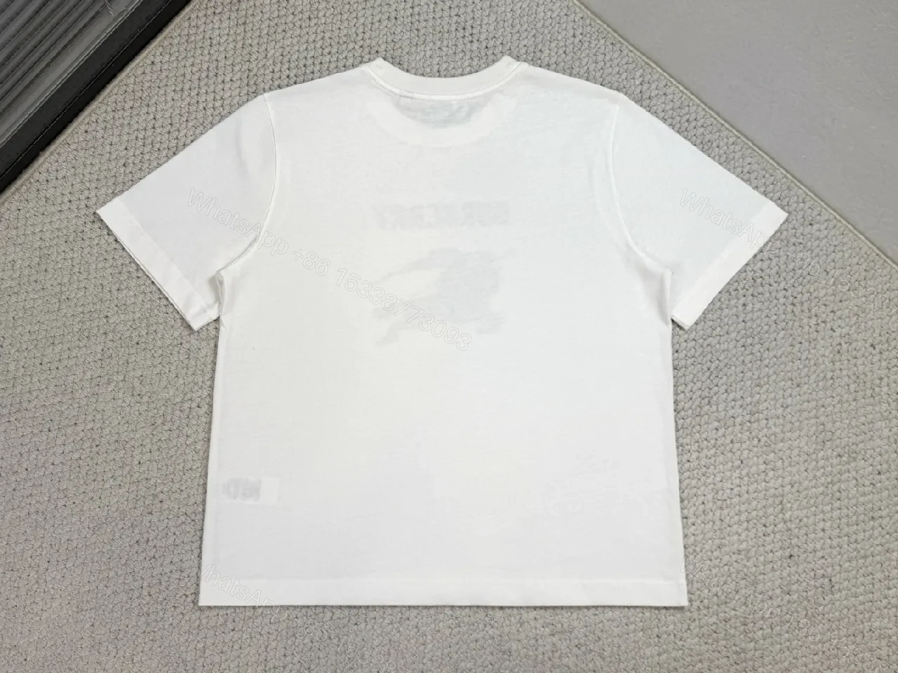 View 7 of White Cotton Tee with Metallic Crest Detailing, Premium Casual Style