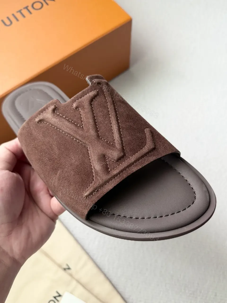 View 3 of Textured Suede Slide with LV Detailing