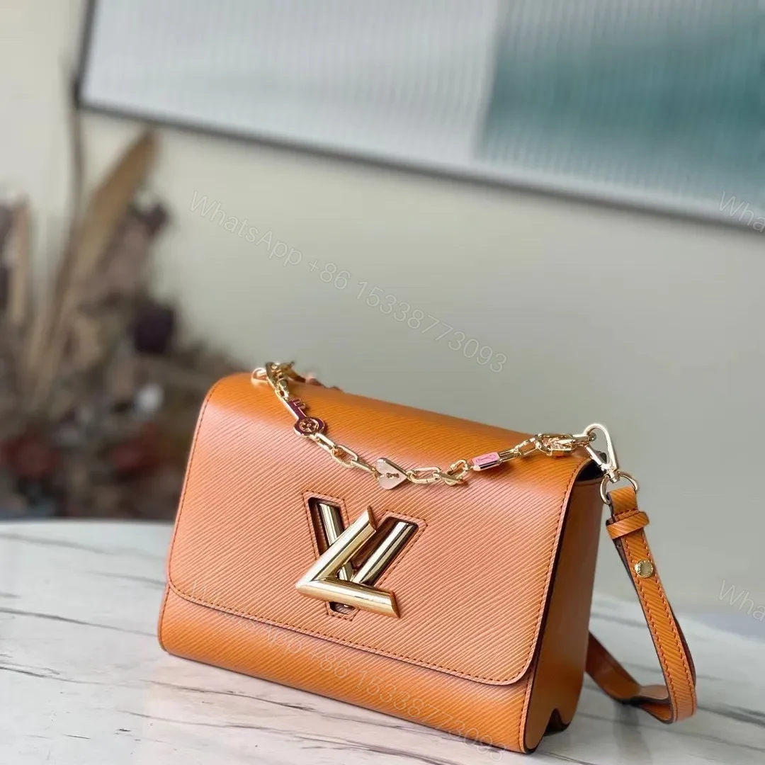 Louis Vuitton LV Twist Mini Orange Handbags 23x17x9cm — view 1