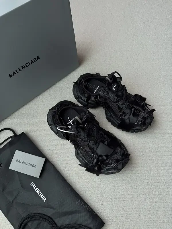 Chunky Textured Luxury Sneakers with Satin Bow Accent — view 1