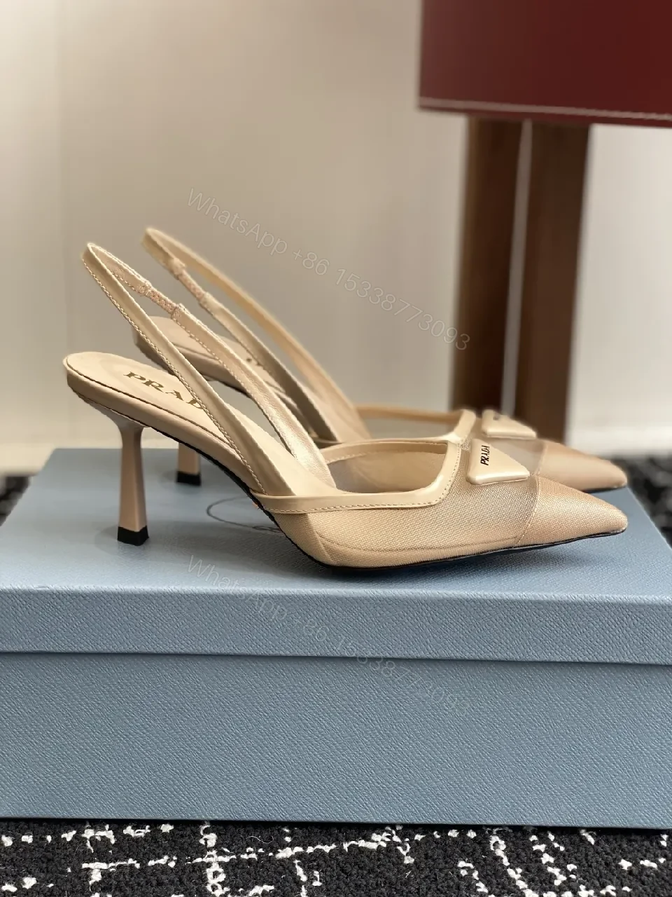 View 9 of Elegant Leather Slingbacks with Triangle Logo Detail