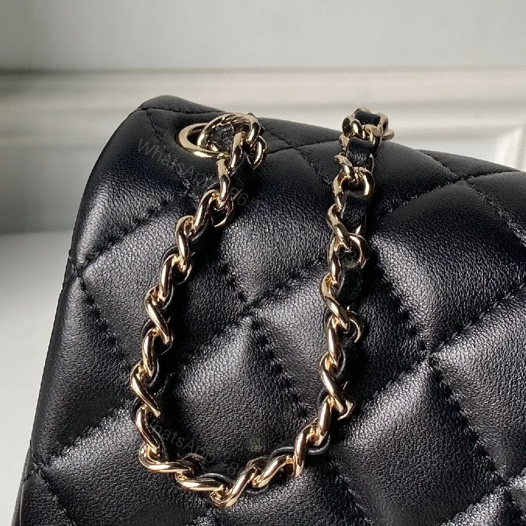 View 5 of Black Quilted Leather Flap Bag with Chain, Classic Weekender Elegance