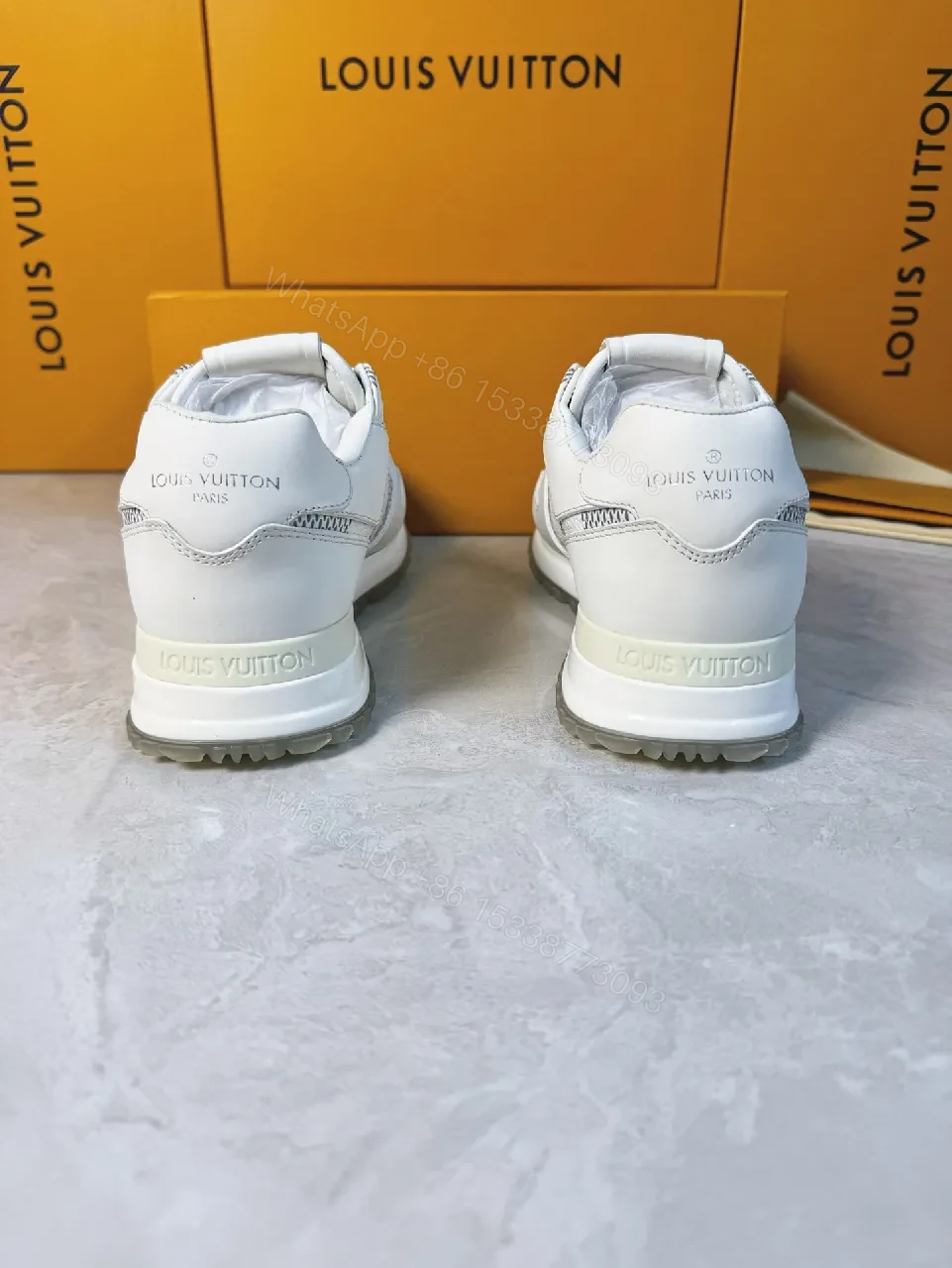 View 4 of Premium Leather Sneakers with Breathable Mesh and LV Detailing