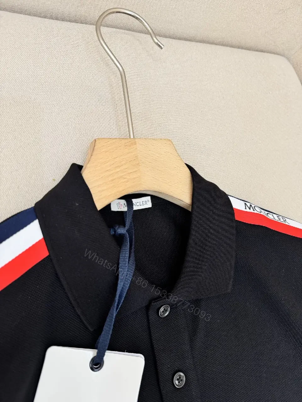 View 11 of Navy cotton polo shirt with red-white striped shoulder accents for everyday luxury
