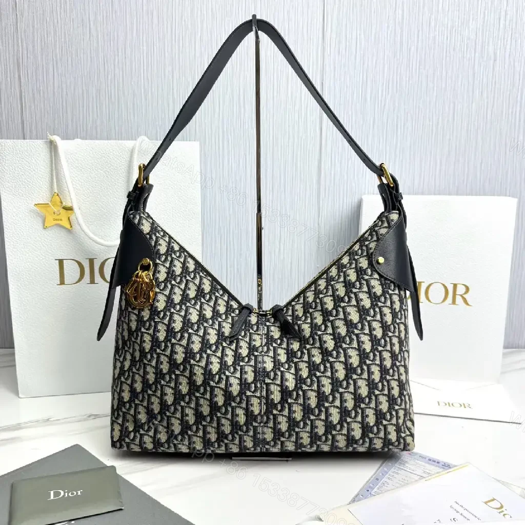 View 2 of Chic Monogram Shoulder Bag: Elegant & Versatile Satchel