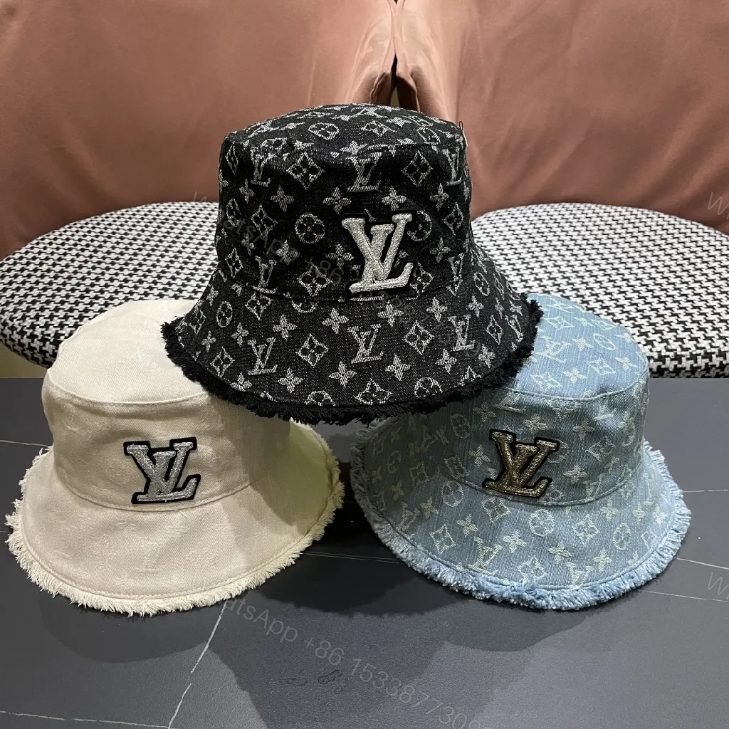 View 7 of Denim Bucket Hat with Monogram Detail – Casual Luxury & Comfort