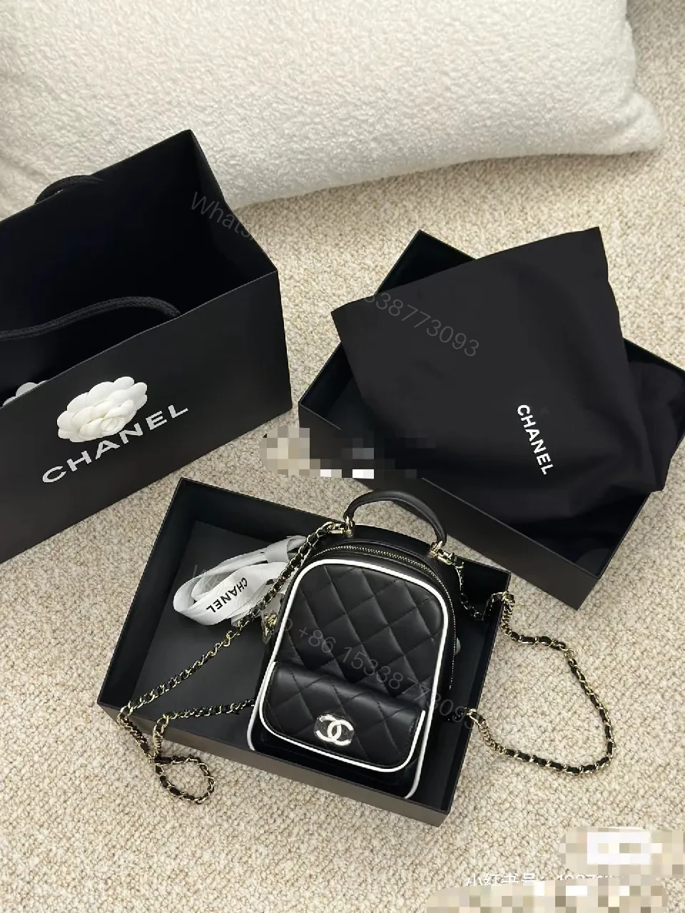 View 8 of Quilted Black Leather Mini Backpack – Luxe, Chain-strap Style