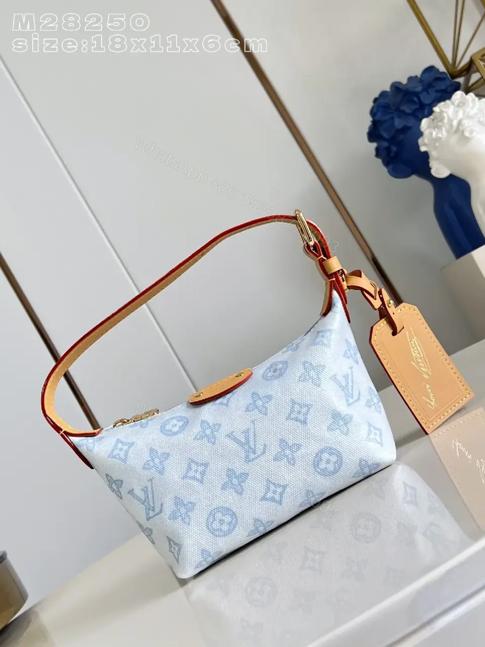 View 7 of Light Denim LV-Patterned Structured Top-Handle Bag