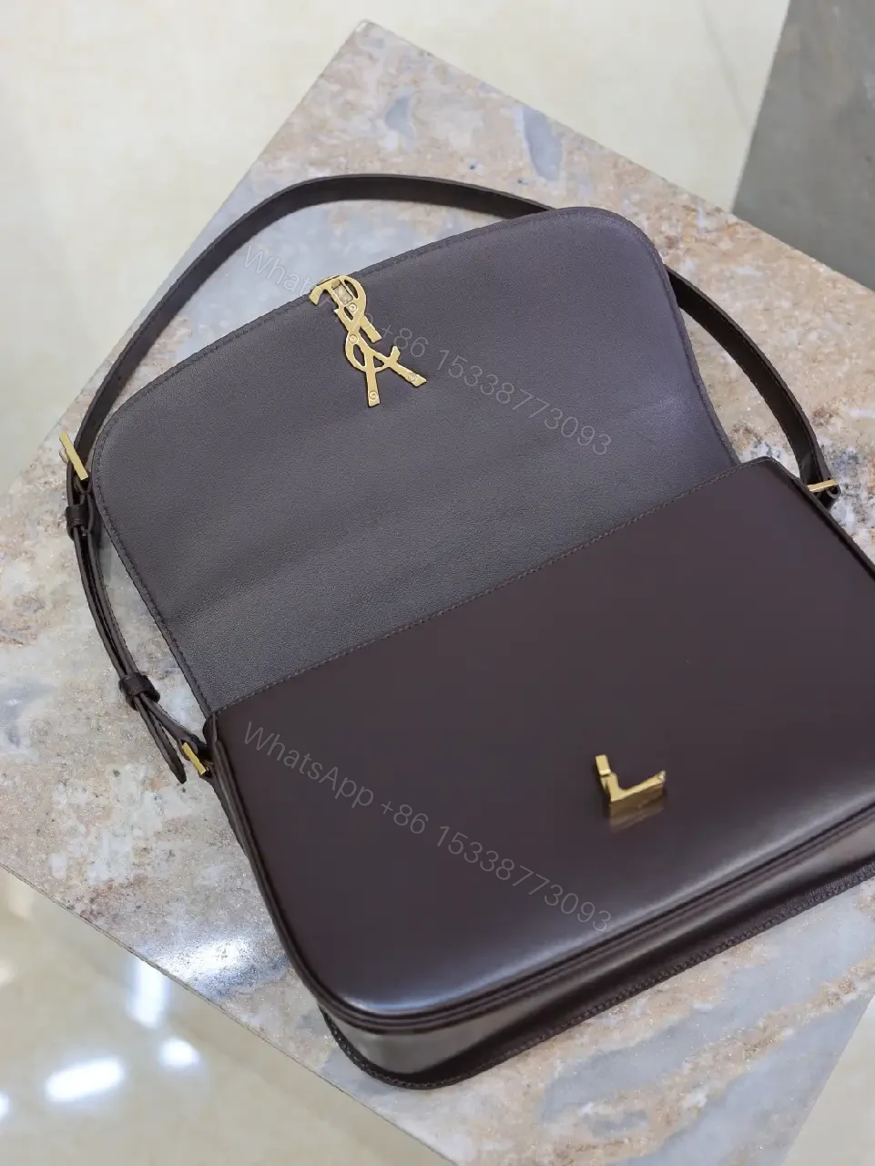 View 8 of Chic Leather Crossbody with Gold-Tone Hardware, Compact Carry
