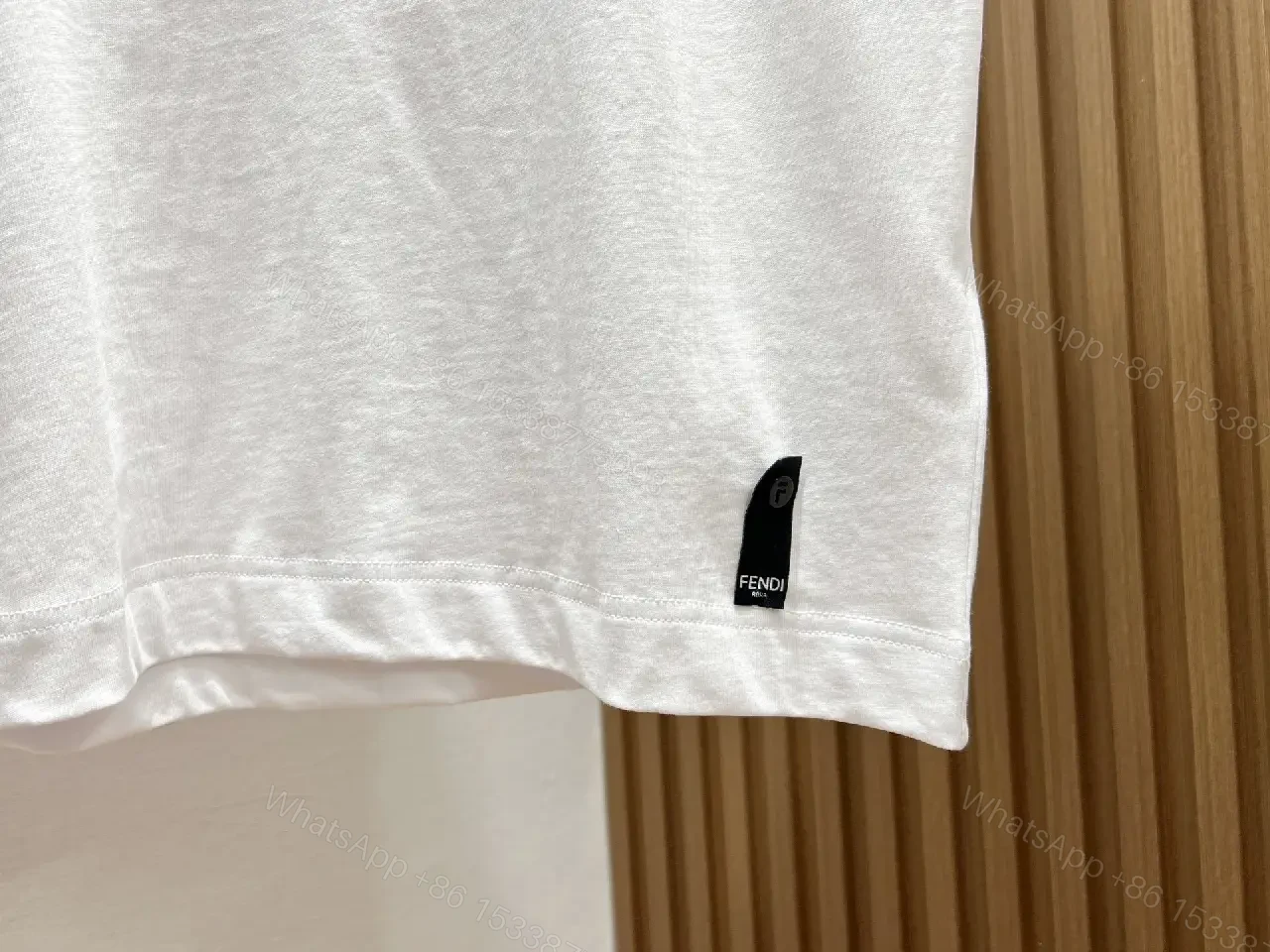 View 7 of Minimalist White Tee: Textured Bear Graphic, Designer-Influenced Luxury Tee