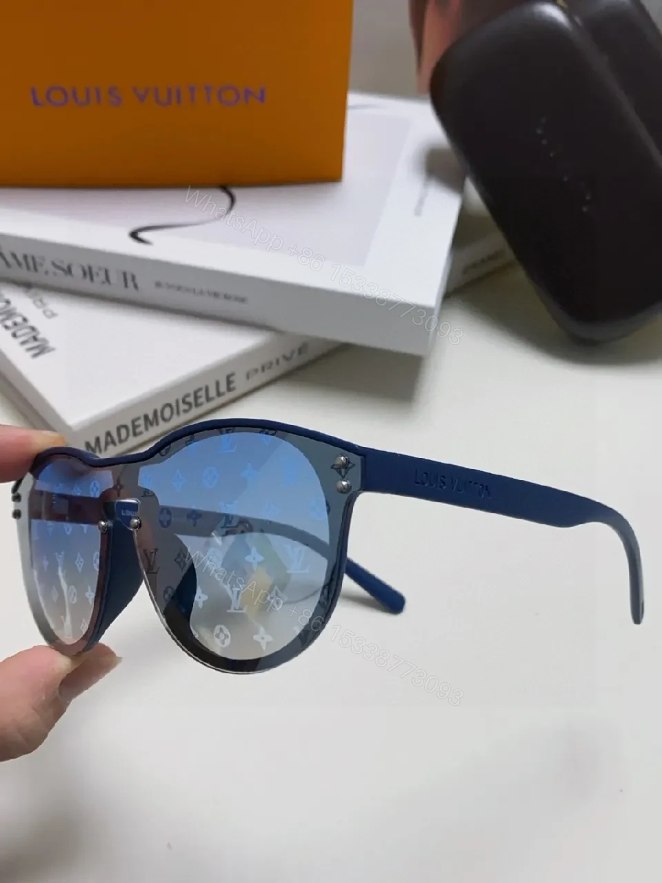 View 4 of Blue Translucent Monogram Shield Sunglasses - Oversized, UV-safe, Light-Weight Acetate