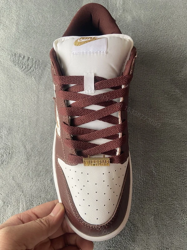 View 11 of Supreme x Nike SB Dunk Low "Brown Stars” DH3228-103