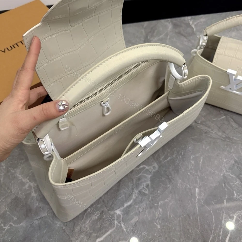 View 6 of Louis Vuitton Capucines MM East West In Grey 33Cm