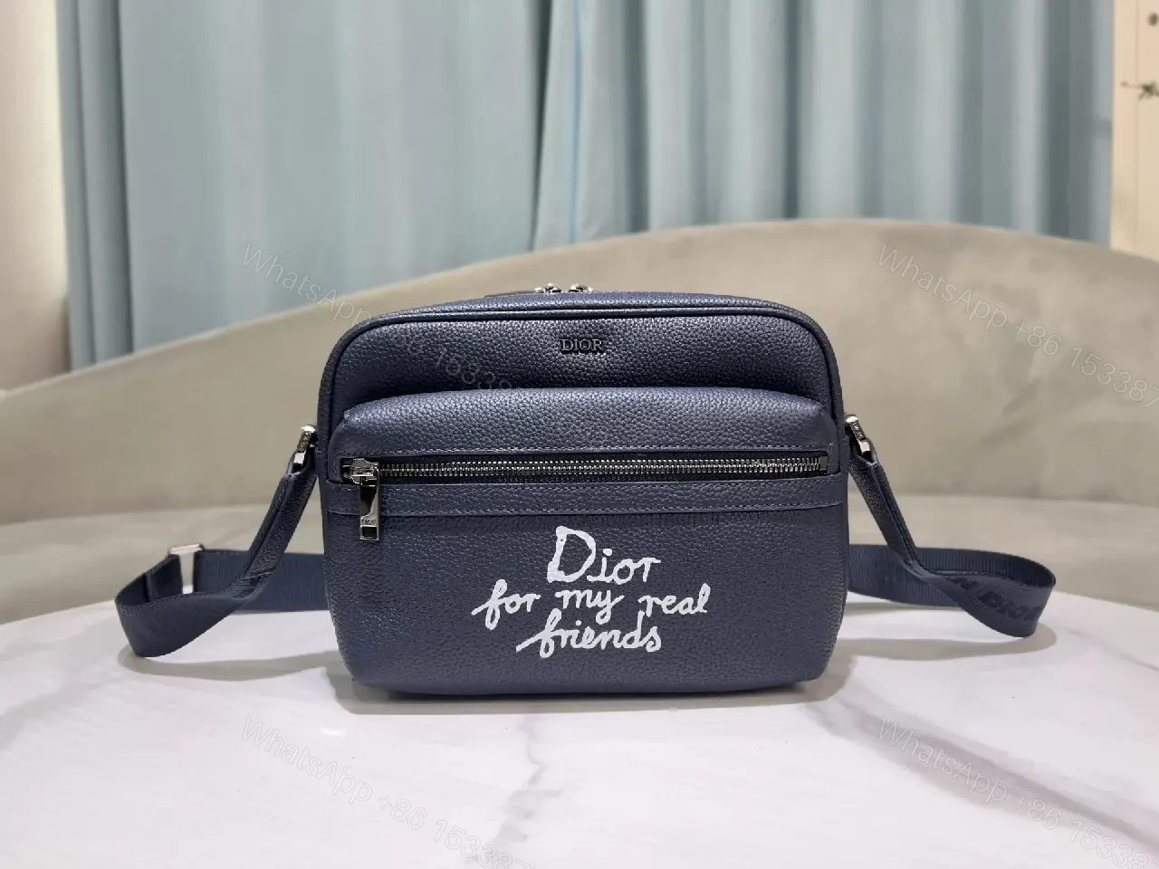View 5 of Blue Leather Crossbody: Compact Luxury with Playful Edge