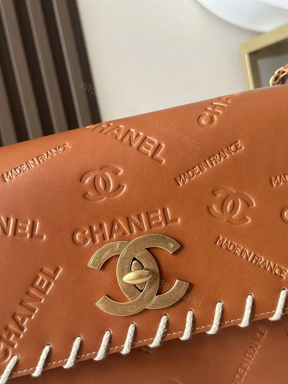 View 7 of Textured Leather Crossbody Wallet Bag with Signature Stitching