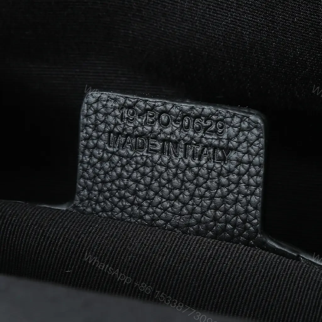 View 2 of Monogram Texture Compact Luxury Backpack - Day-to-Night Utility