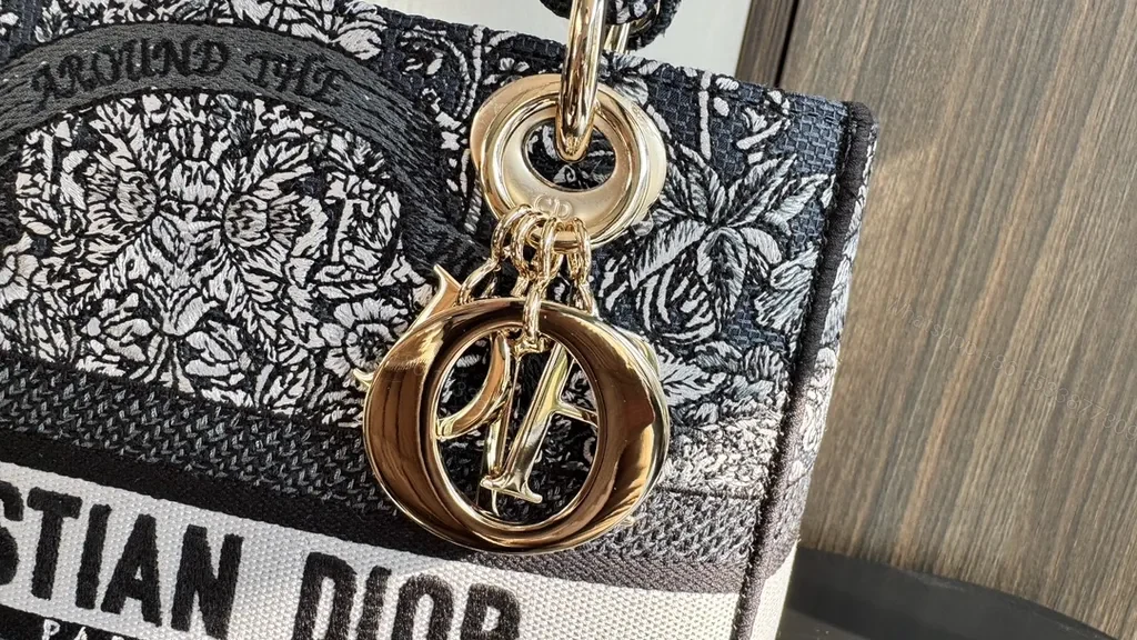 View 4 of Dior Compact Satchel: Textured Luxury with Bold Branding
