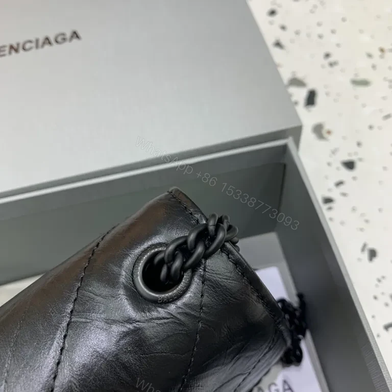 View 7 of Quilted Leather Crossbody: Compact Luxury Bag