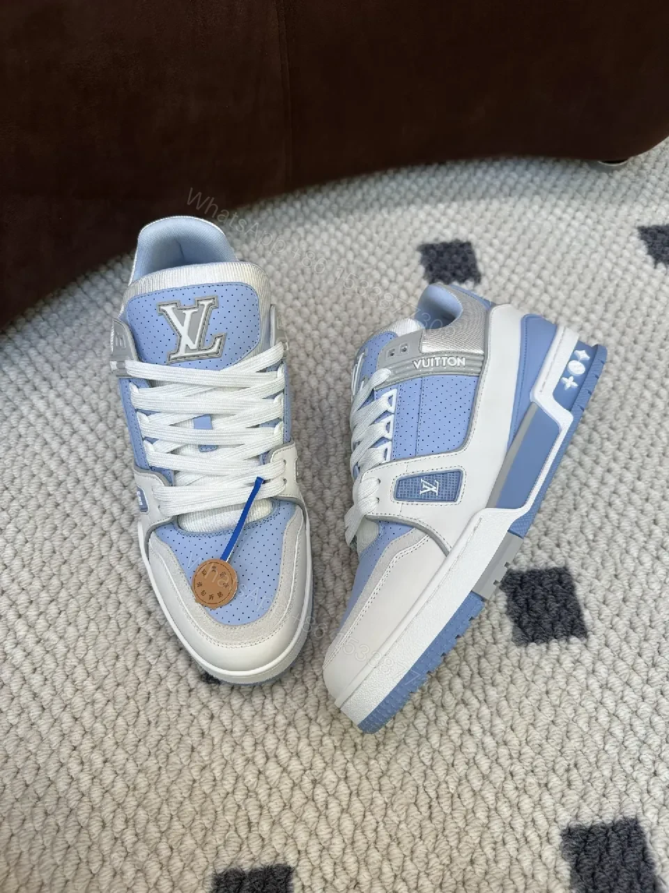View 7 of Light-Blue Perforated Panels Modern Low-Top Sneakers with LV-Inspired Accents