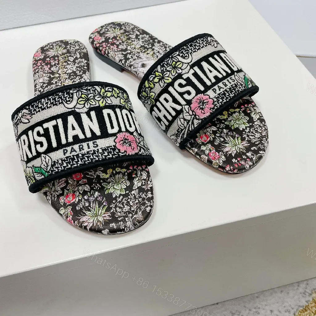 View 2 of Floral-Print Slides in Black with Signature Dior Strap