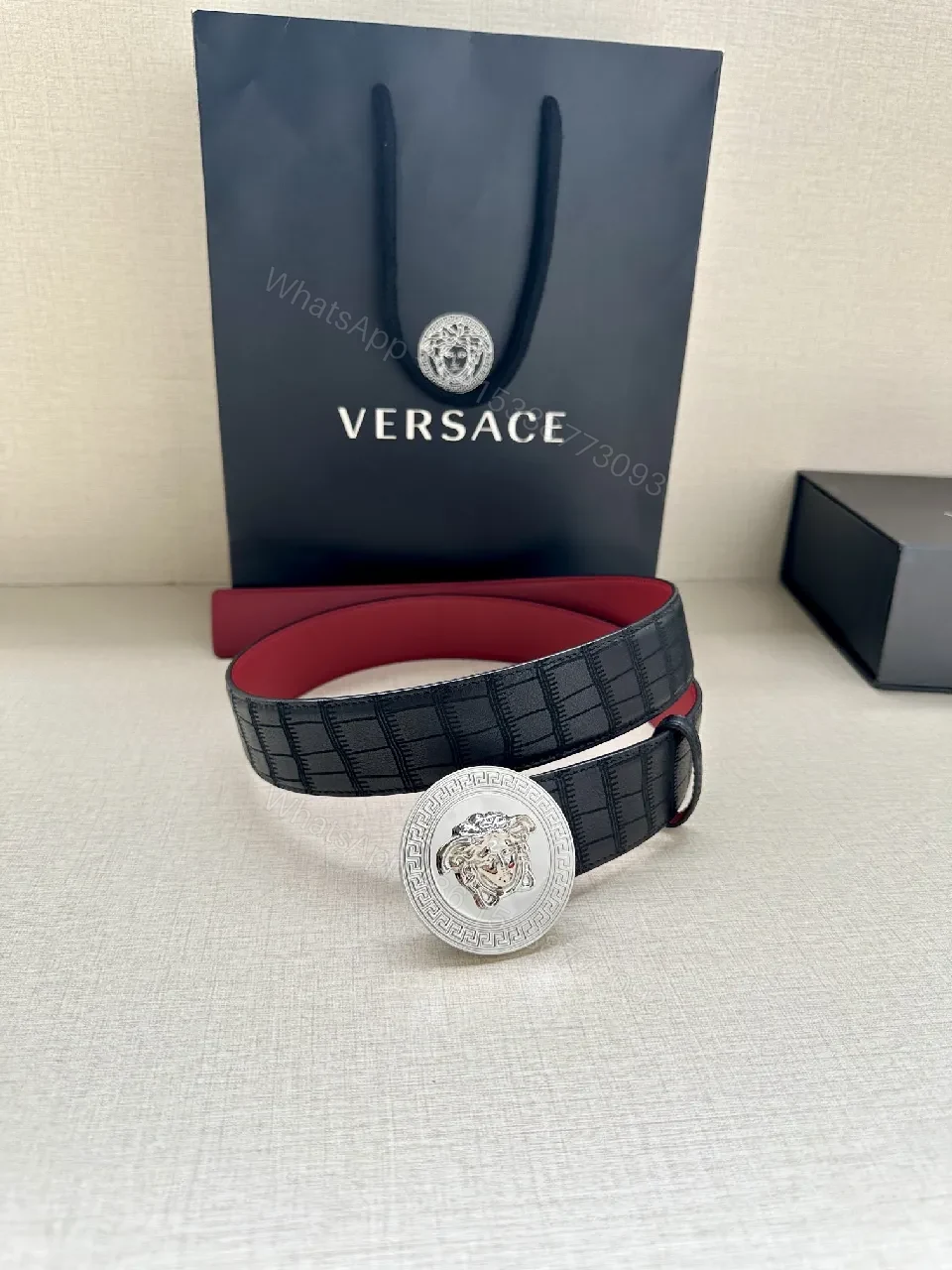 View 4 of Textured Leather Belt with Medusa Buckle - Crocodile-Embossed, Black/Burgundy, Luxury Belt
