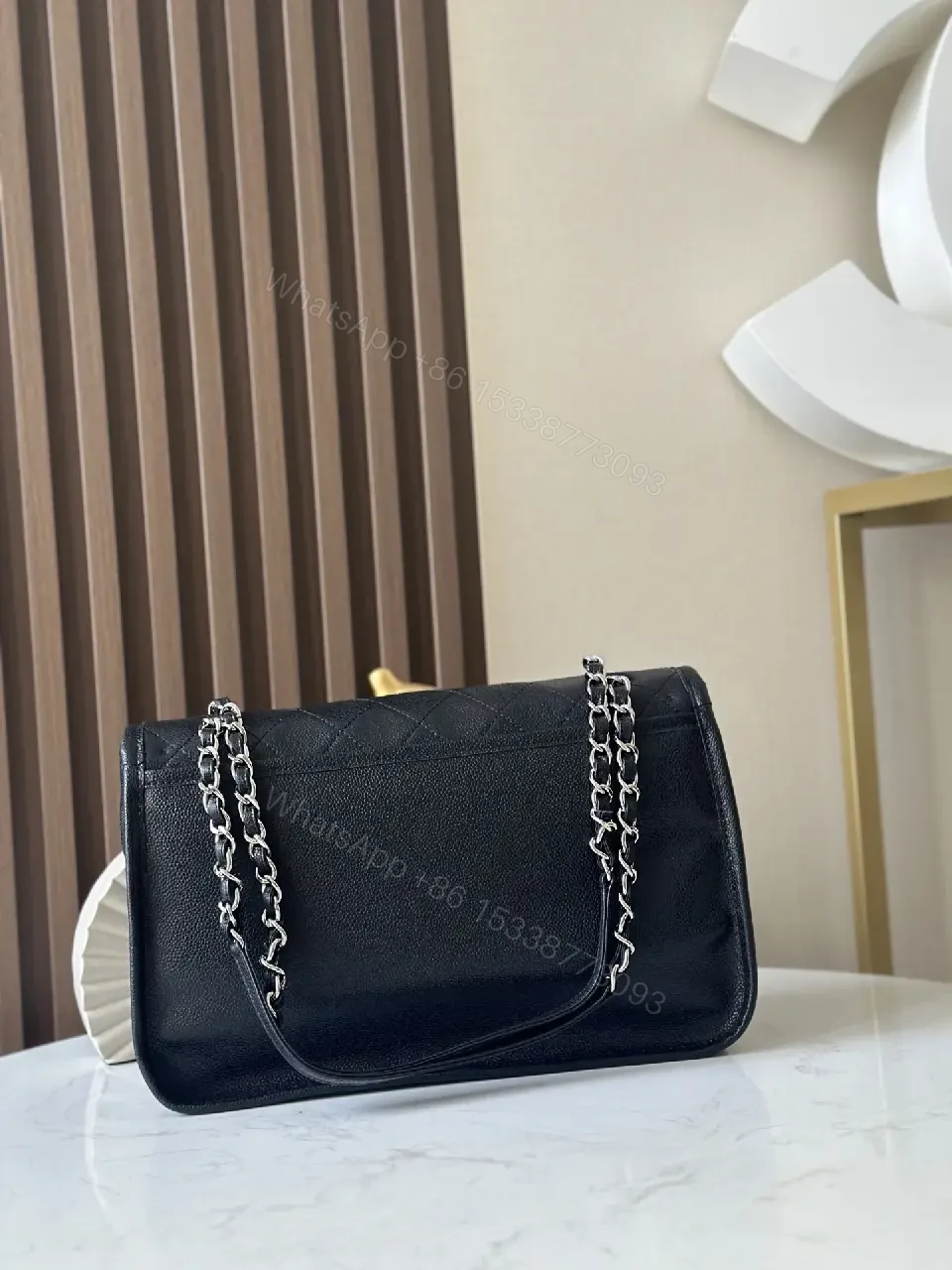 View 7 of Quilted Crossbody Bag: Navy Leatherette, Iconic Hardware, Compact Luxury