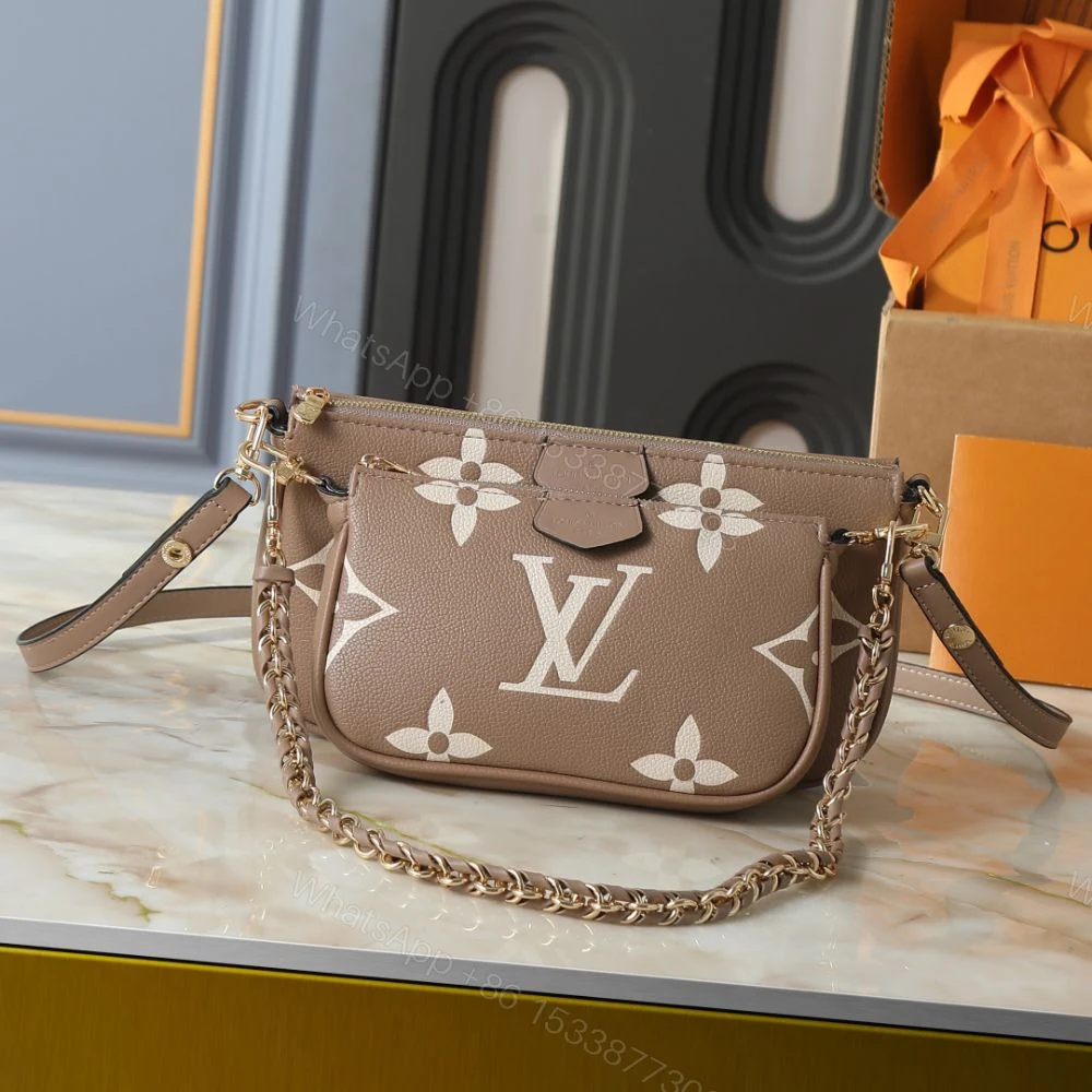 View 2 of Louis Vuitton Multi Pochette Accessoires Monogram Empreinte Greige 25Cm