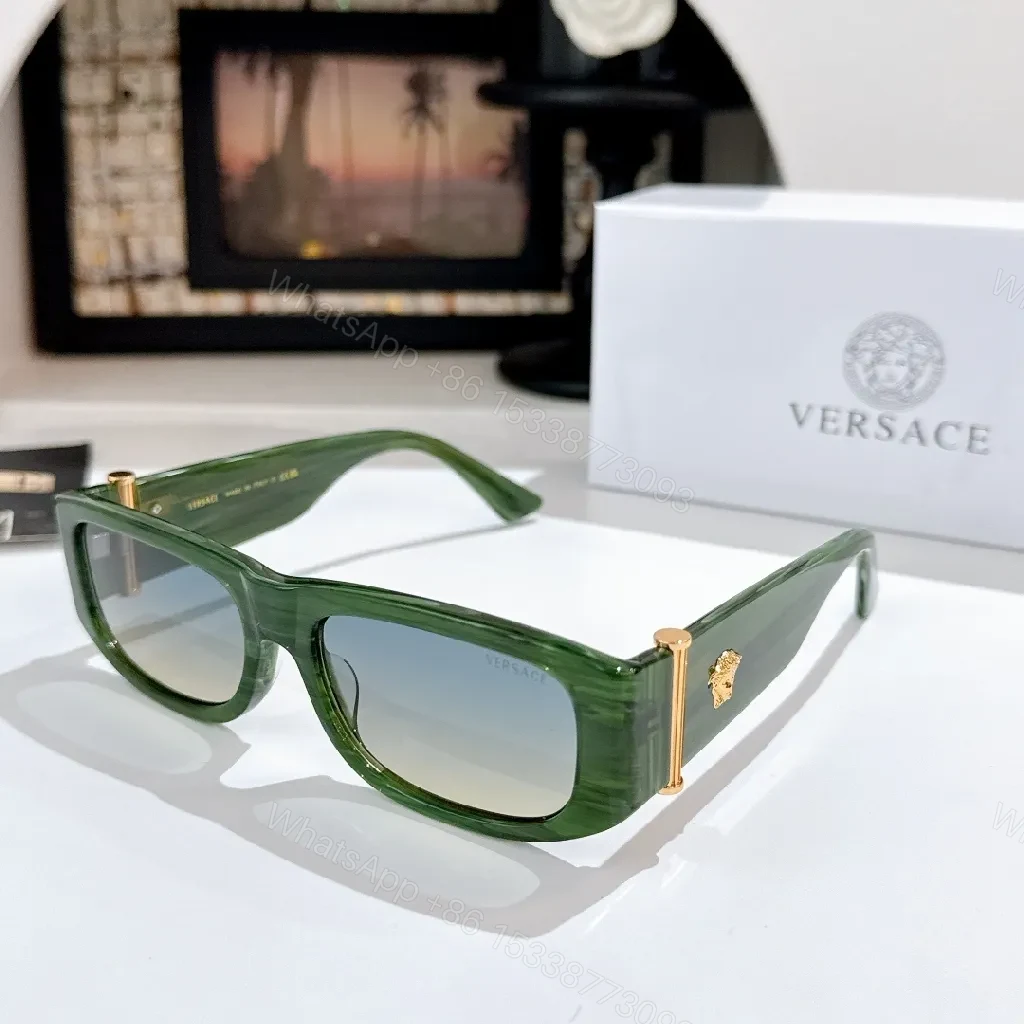 Green Marbled Sunglasses with Gold Accents, Gradient Lenses, Unisex — view 1