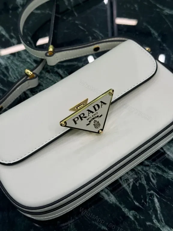 View 4 of Elegant Leather Crossbody Bag: Prada Triangle, Structured Luxury