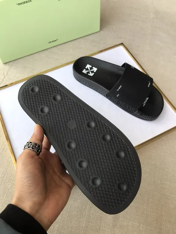 View 5 of Minimalist Black Faux-Leather Slip-Ons: Iconic Texture Slides